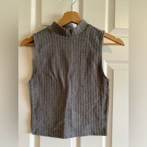 Fitted sleeveless turtleneck tank